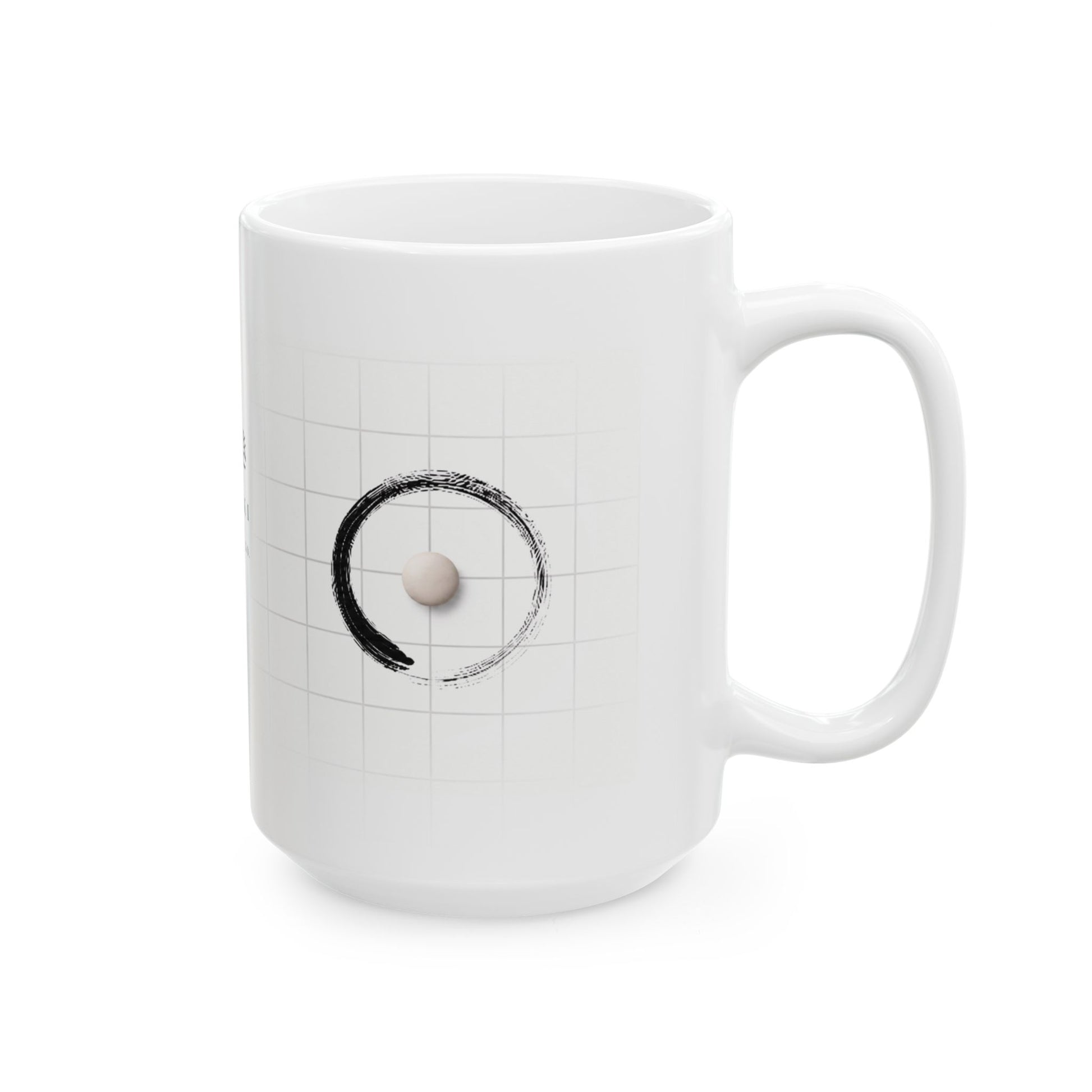 White mug with a black and gray design  of a white go stone surrounded by an enzo, on a white background